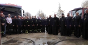 zdjęcie pamiątkowe strażaków i zaproszonych gości, duchowieństwo