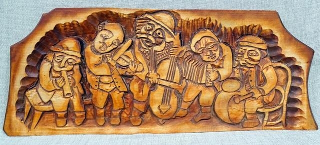 płaskorzeźba prezentująca grupę grajków