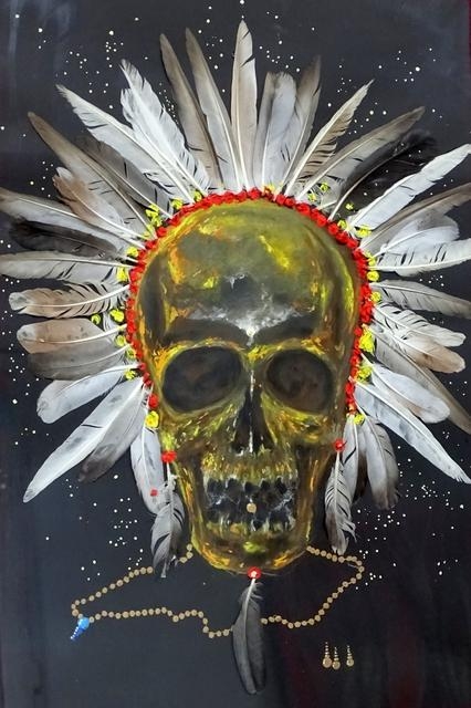 portert czaszki z pióropuszem wokół