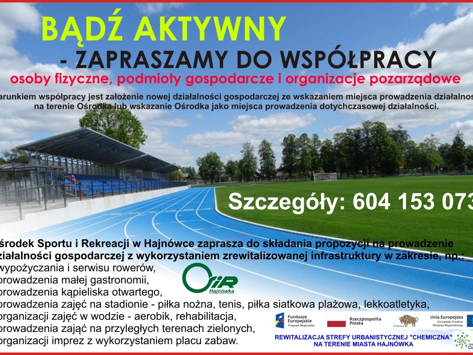 Plakat informujący o możliwości prowadzenia działalności, w tle stadion.