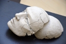 Wystawa Mai Bernaczek w Hajnowskim Domu Kultury - rzeźba - maska ludzkiej twarzy
